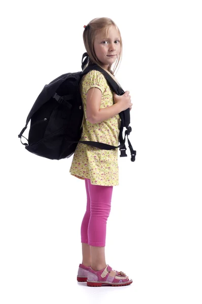 Little girl with heavy backpack — Stock Photo, Image