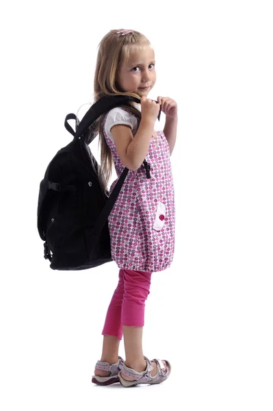 Liten flicka med tung ryggsäck — Stockfoto