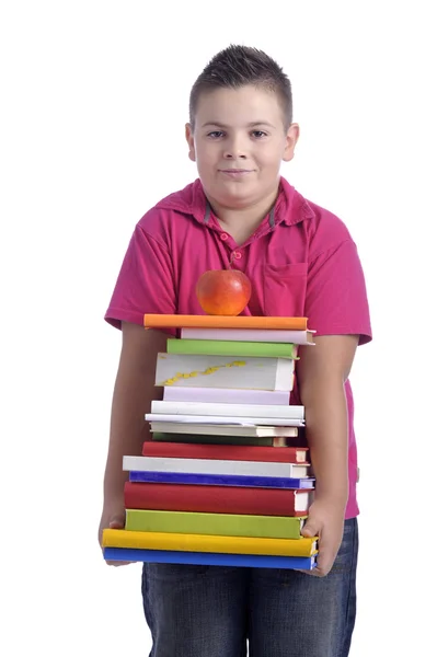 Chico con pila de libros — Foto de Stock