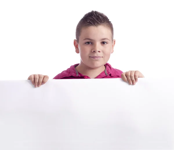 Rapaz segurando um espaço publicitário — Fotografia de Stock