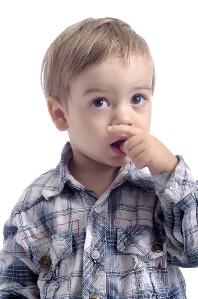 Malý chlapec s palcem v jeho ústí — Stock fotografie