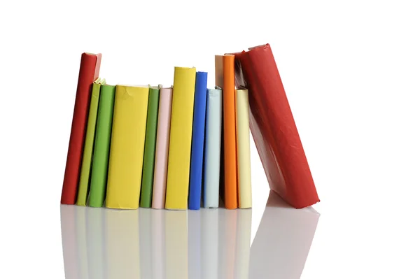 Books in a row on white — Stock Photo, Image