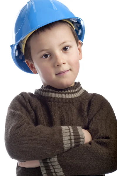 Bambino con casco di protezione, braccia incrociate , — Foto Stock