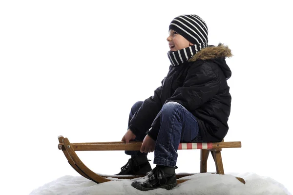 Little boy on sledge — Stock Photo, Image