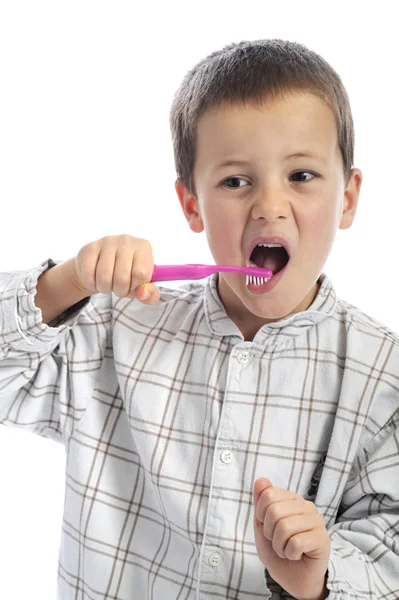 그의 이빨을 청소 하는 어린 소년 로열티 프리 스톡 이미지