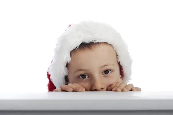Malý chlapec s vánočními klobouk — Stock fotografie