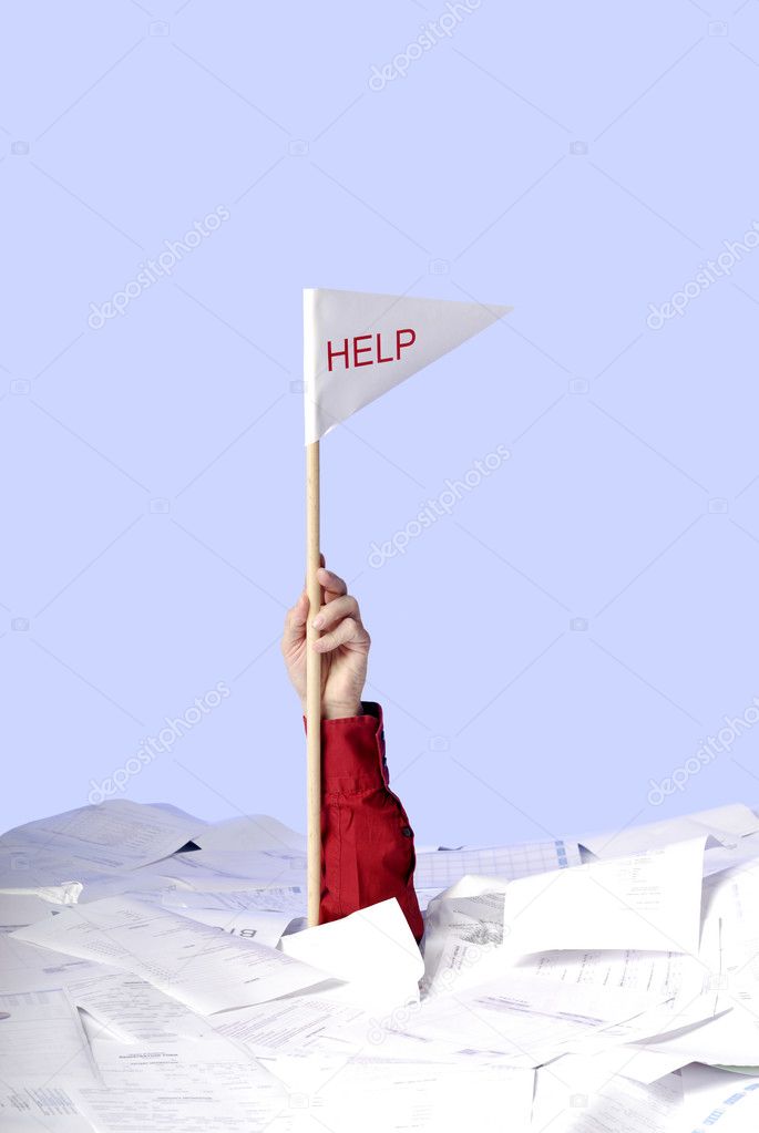 Hand with help flag sticking out of papers
