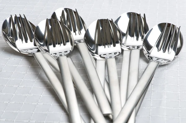 Stack of spoons and forks — Stock Photo, Image