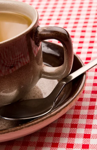 Spoon and coffee cup — Stock Photo, Image