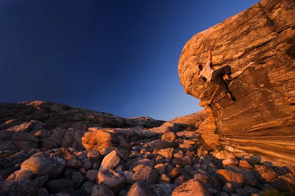 stock image Climber reaching towards the top