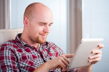 Man with tablet computer clipart