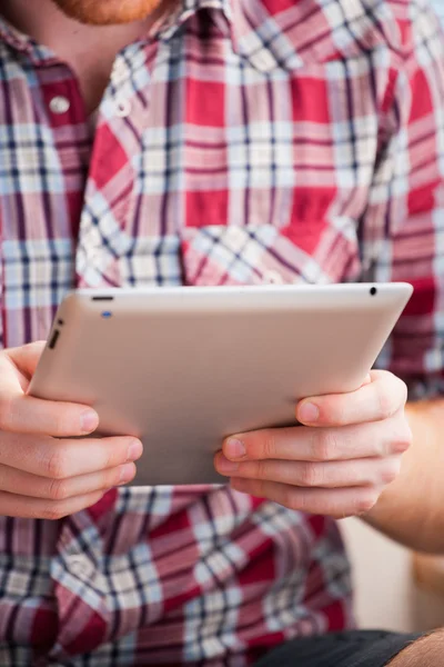 stock image Male hands using a tablet