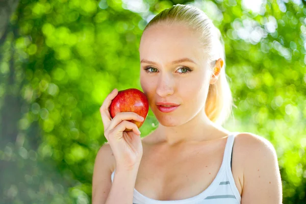 stock image Young woman with an apple
